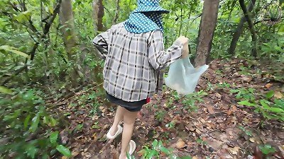A Thai chick ambles and violent while picking mu in the forest. She secretly shows off her skills in the deep forest. Her voice is clear Thai.