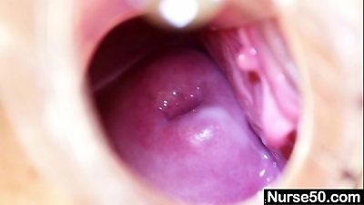 ash-blonde granny nurse self exam with cunt spreader